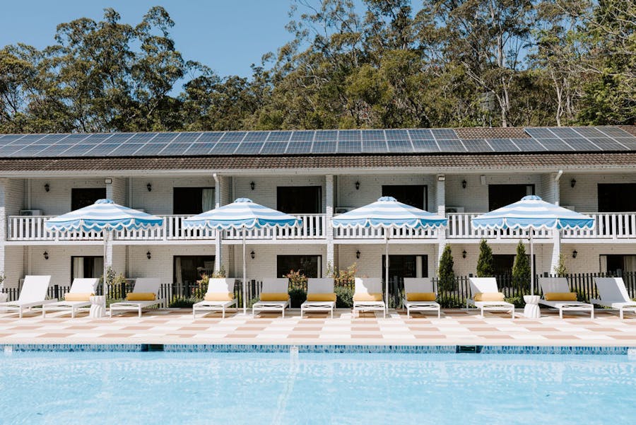 Umbrellas, deck chairs and the pool