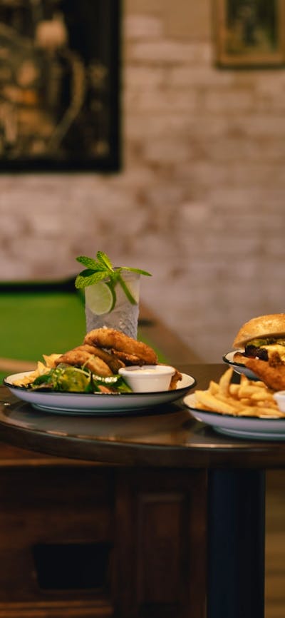 Enjoy a game of pool in the front bar with a cold beer and great food