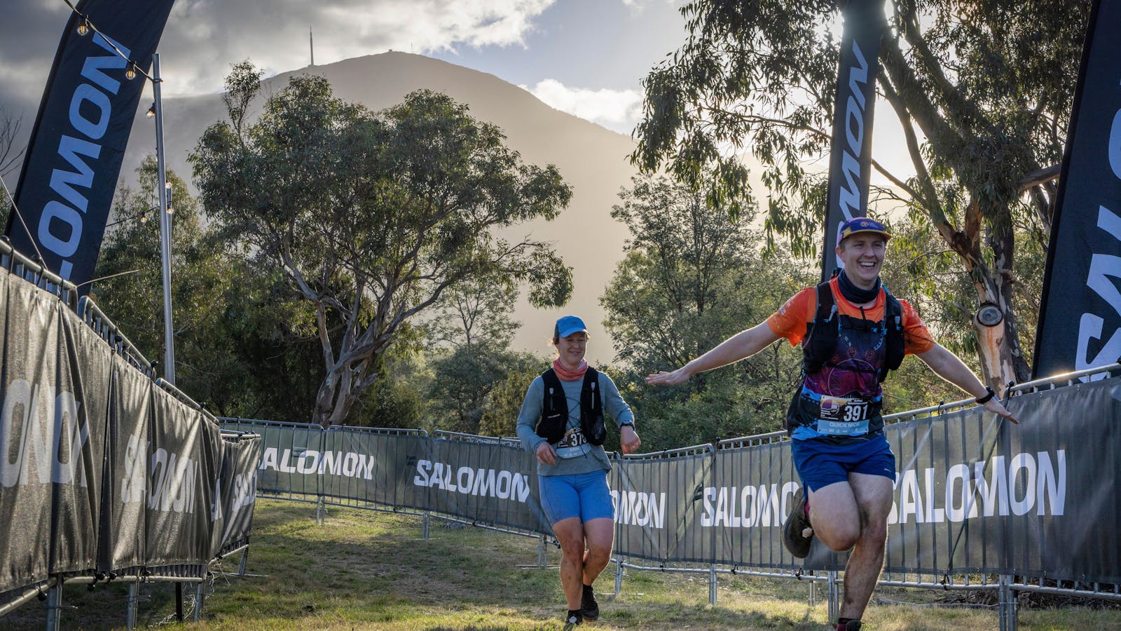 Crossing the finish line with Kunanyi towering above