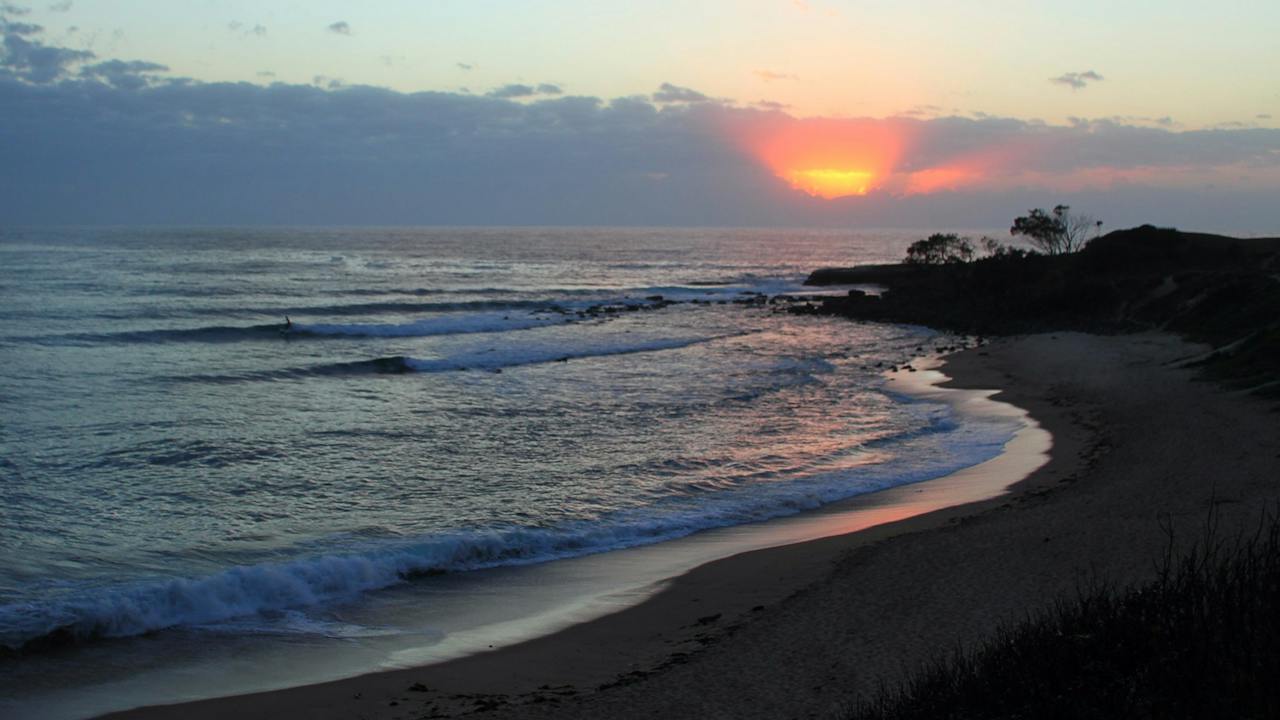 Dawn breaks over Angourie Point.