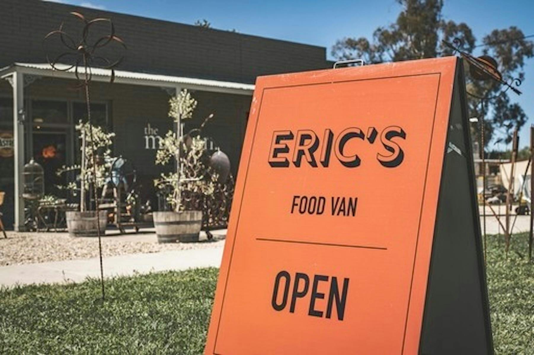 Close up of Eric's Food Van sign in front of the Malbon's entrance.