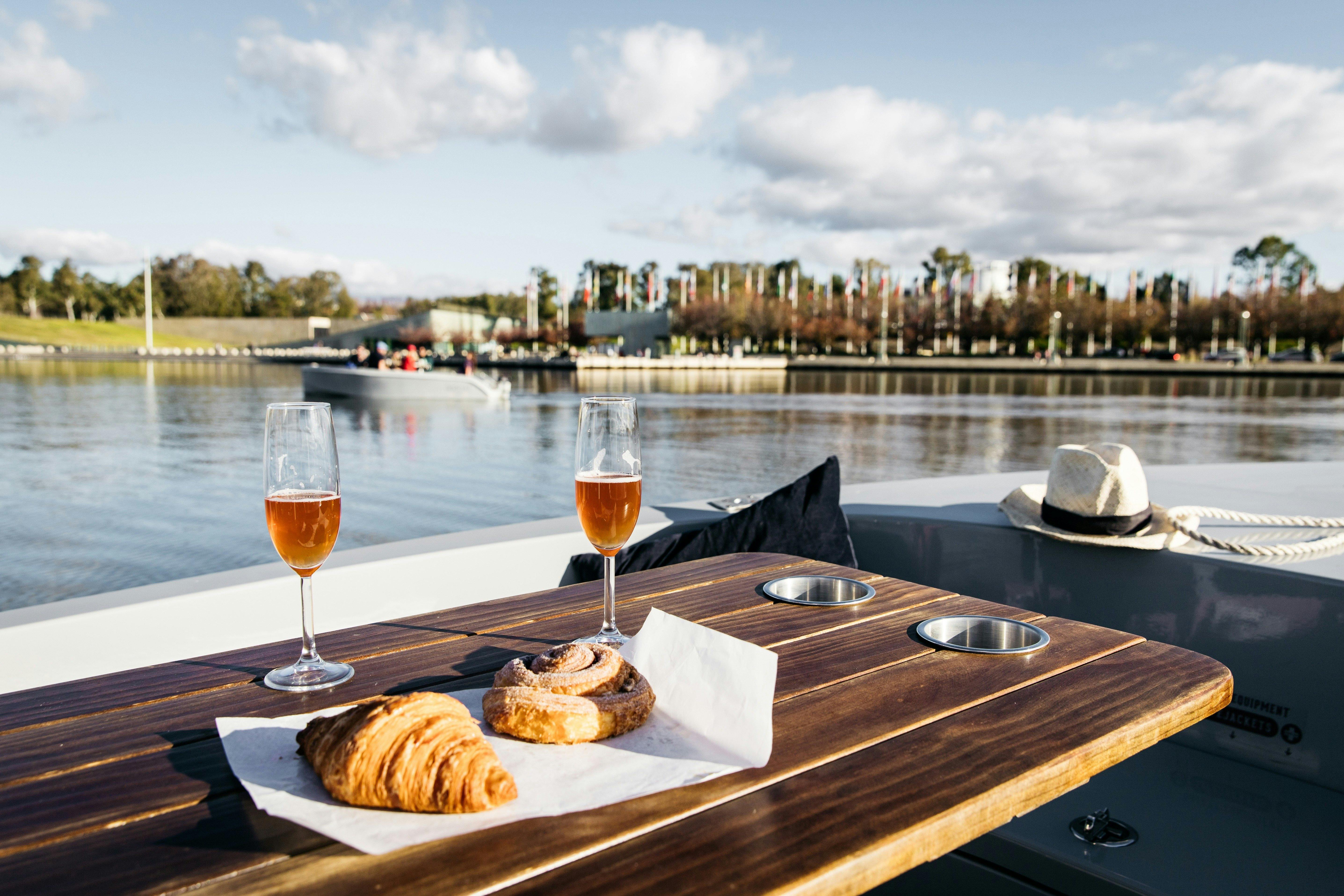 Two boats on the water at sunset