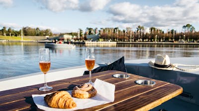 Two boats on the water at sunset