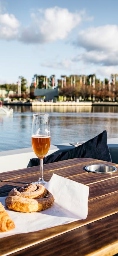 Two boats on the water at sunset