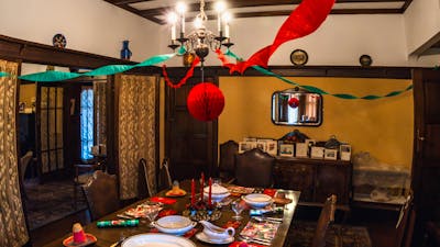 Calthorpes House dining room laid out with historical Christmas setting