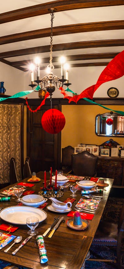 Calthorpes House dining room laid out with historical Christmas setting