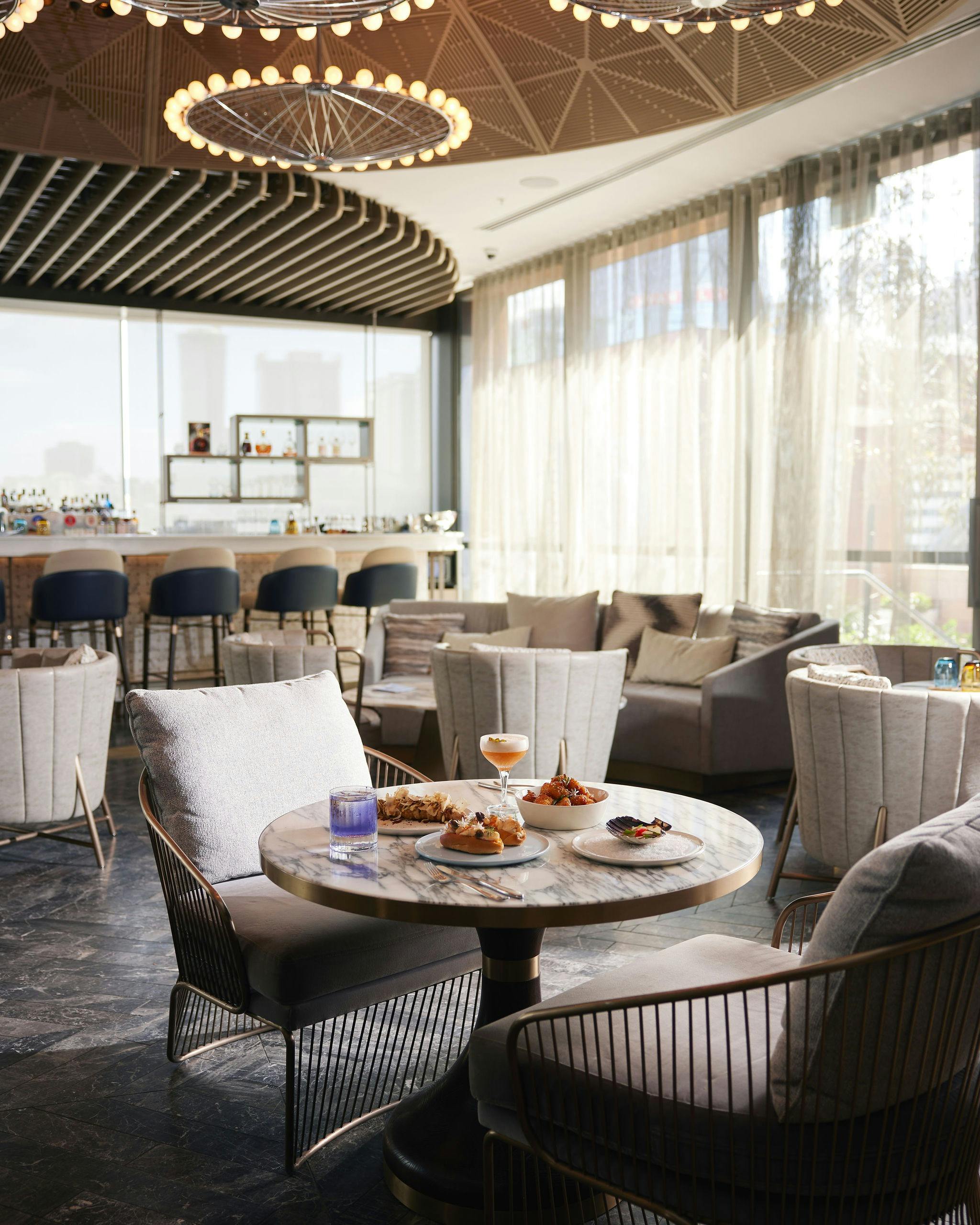 Table in Songbird with food and drinks