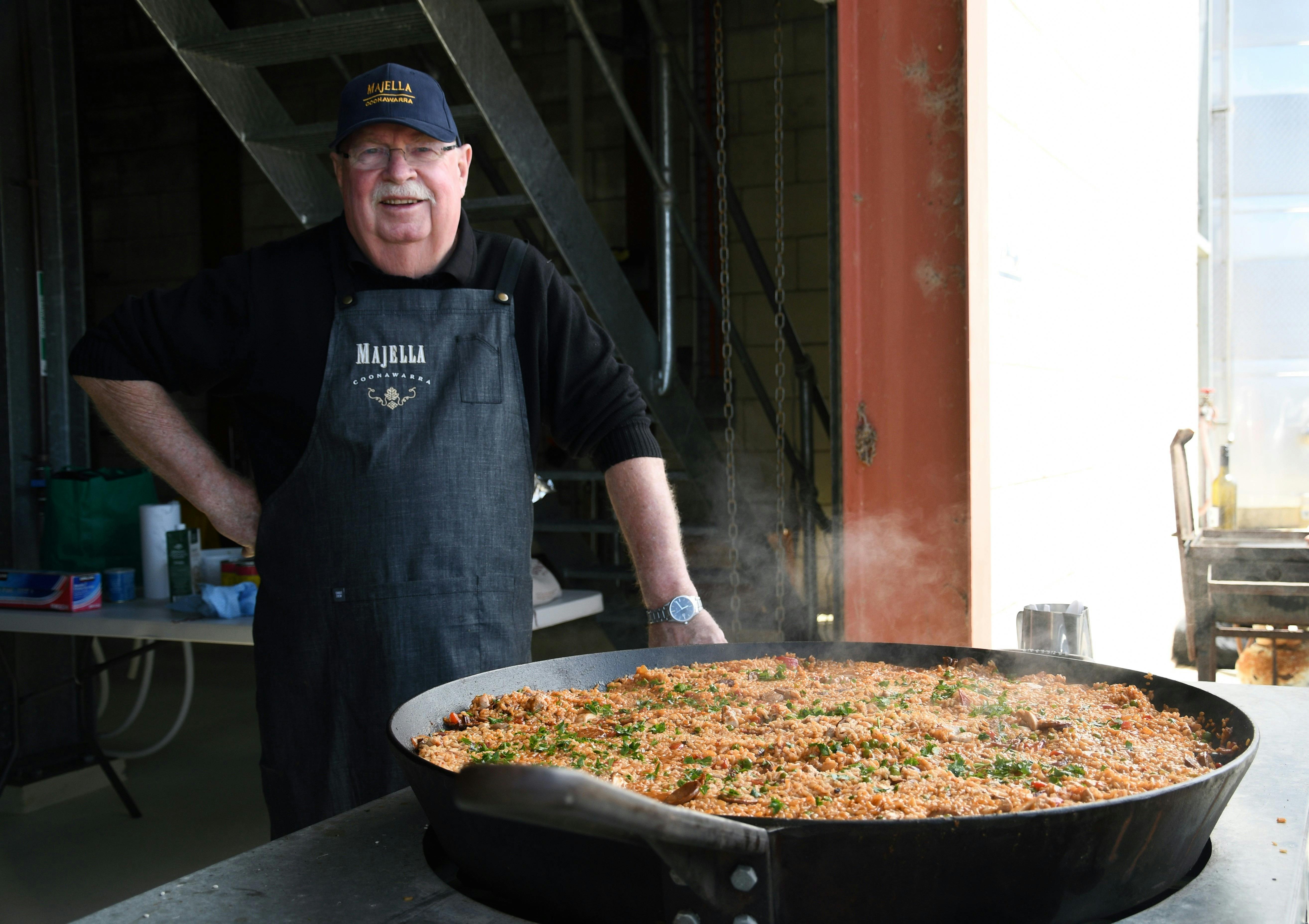 Brian "prof" Lynn with a large pan of paella