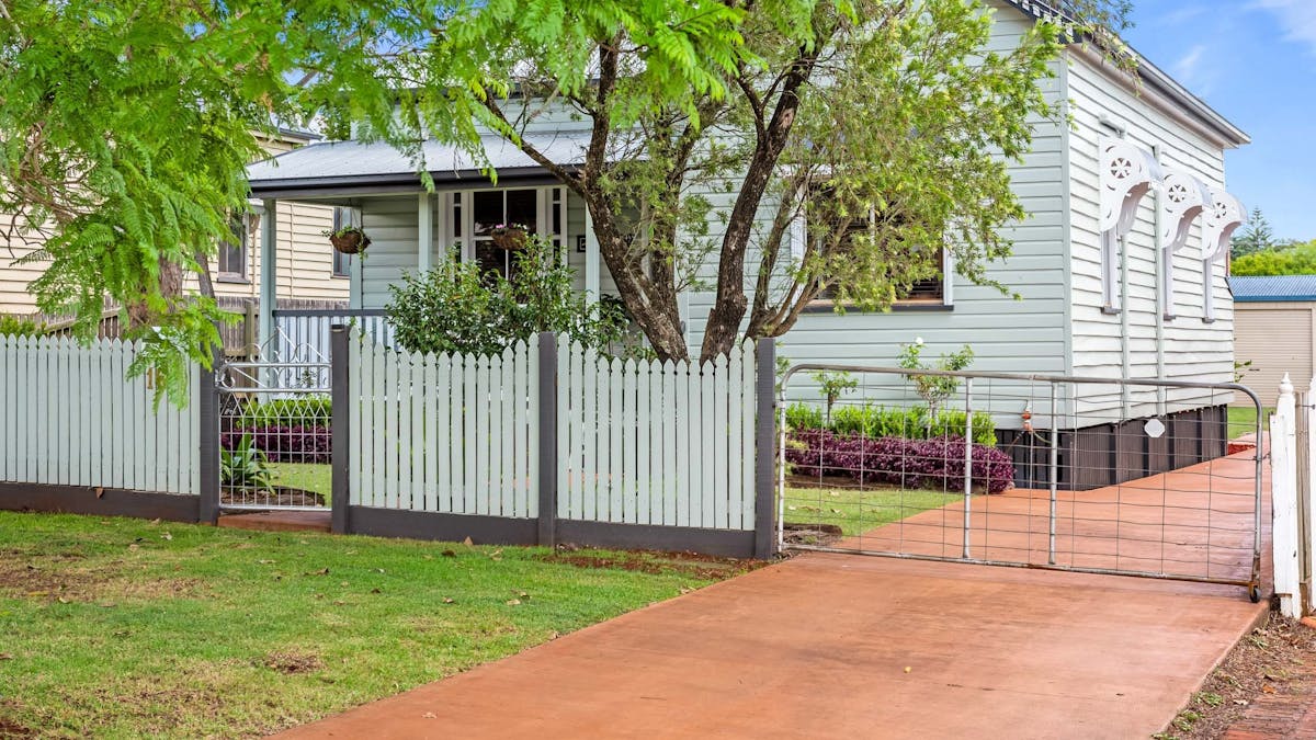 Fully fenced - driveway to rear shed.