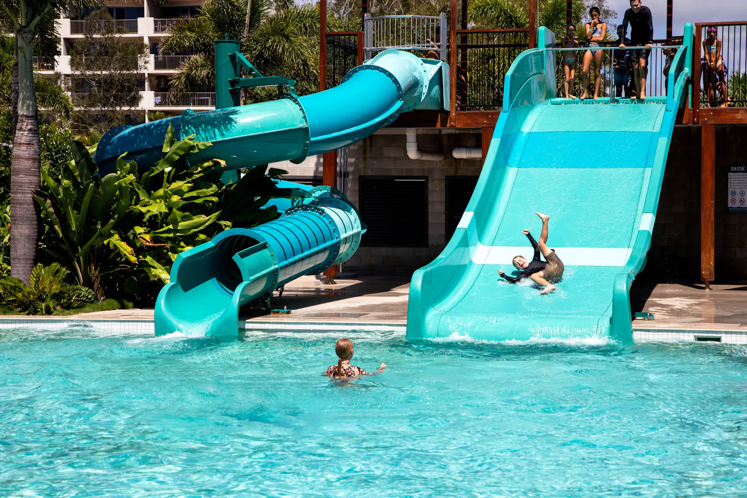 Two waterslides into a lagoon pool