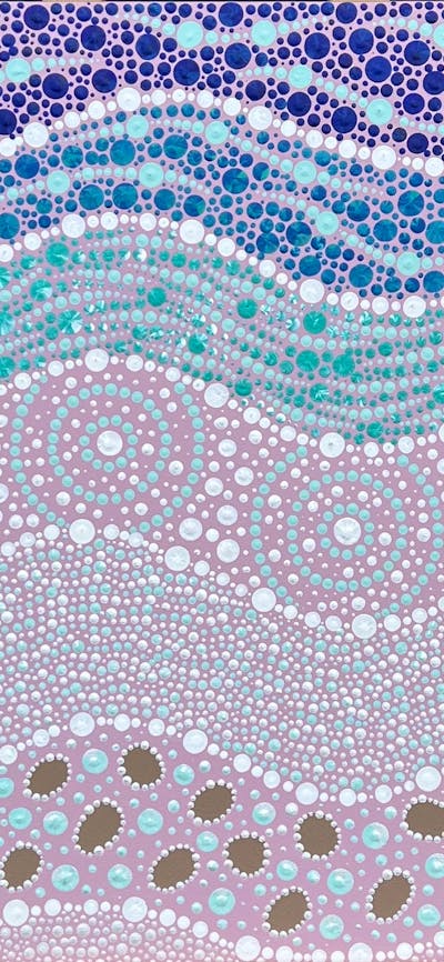A indigenous painted landscape featuring a soft pastel palette and various sized dots