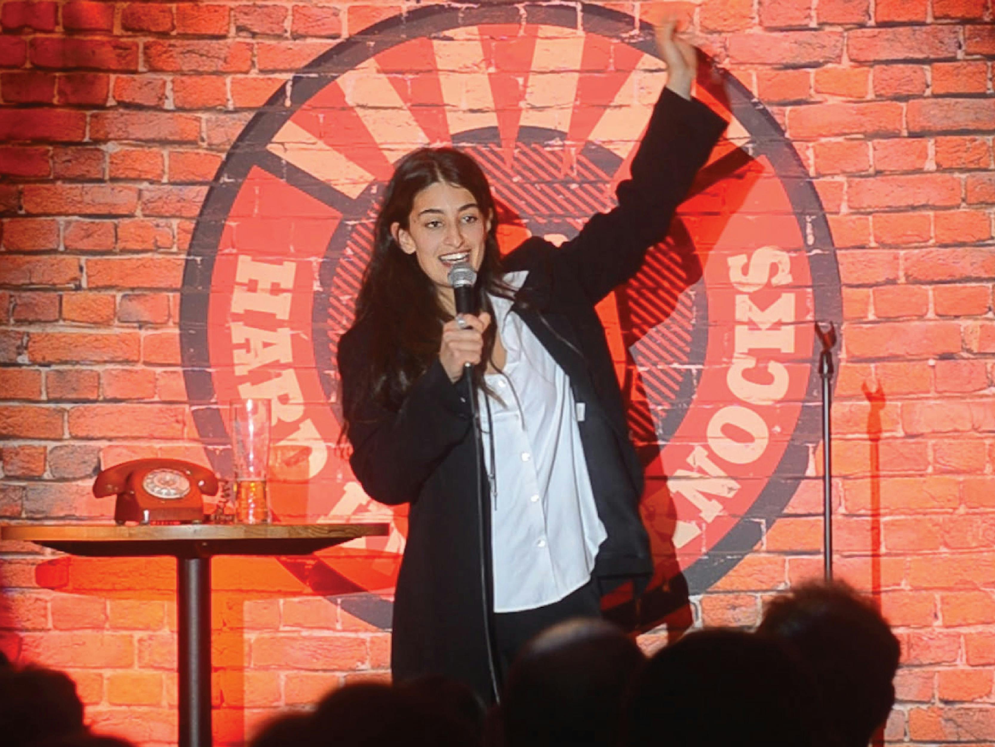 Student performing stand-up comedey