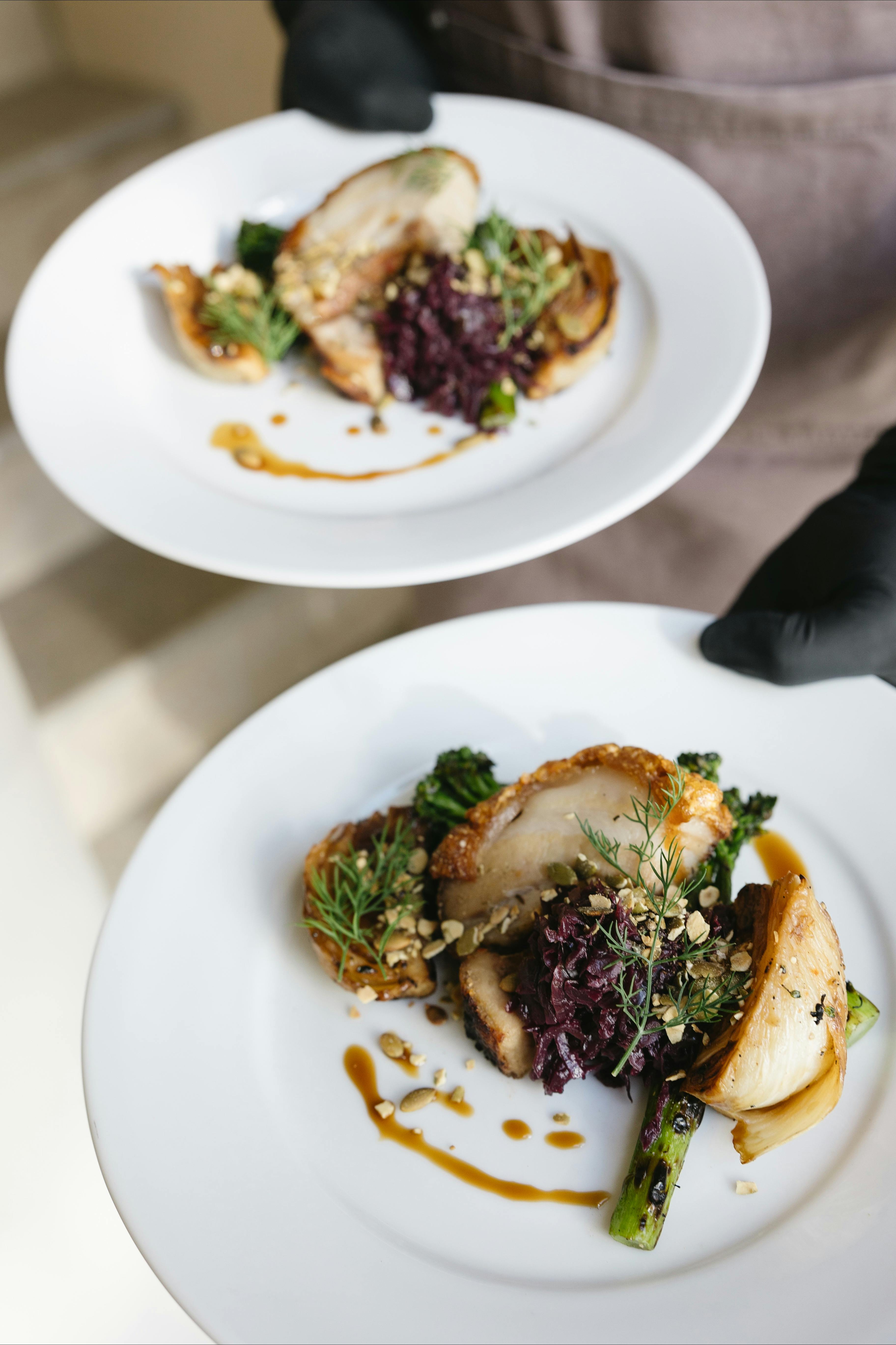 Roasted Porchetta, caramelised fennel, puree, charred broccolini, cabbage jam, jus & eshallot