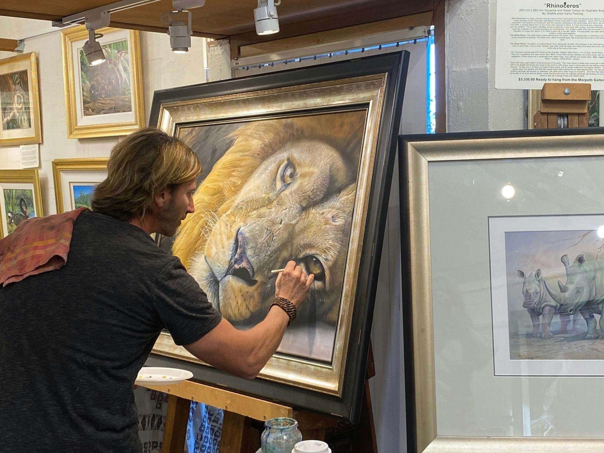 Several times a years artists travel to the gallery to demonstrate their painting skills.