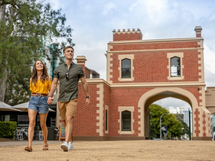 Couple enjoying a walk through Parramatta Park