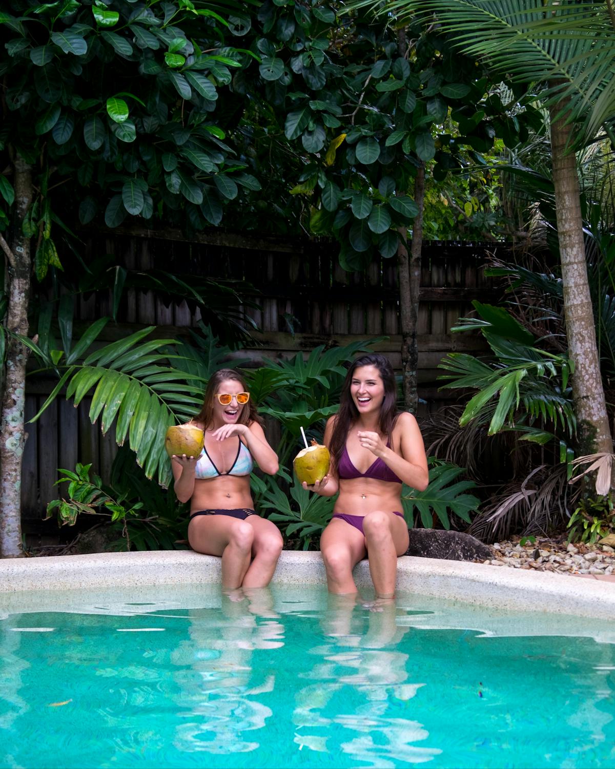 Sipping coconuts by the pool