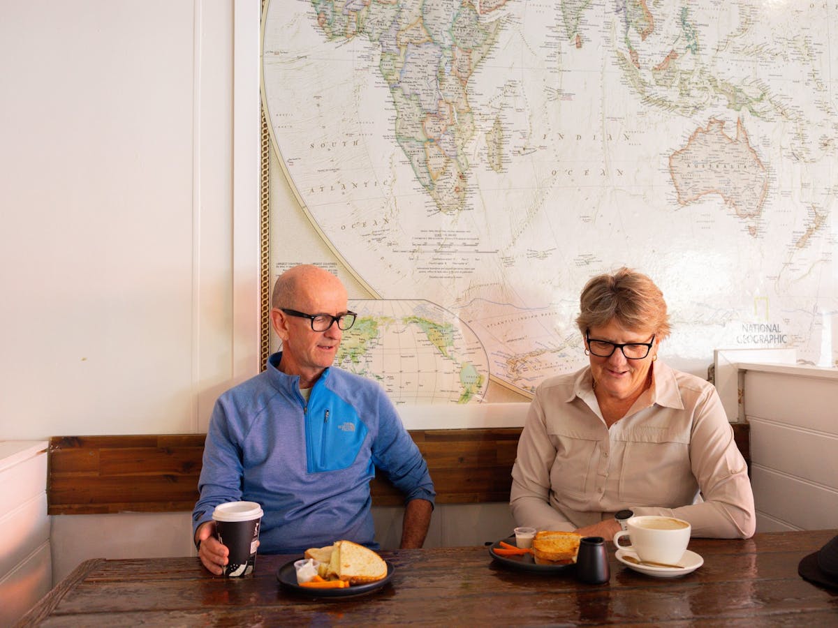 Couple enjoying sandwiches at Mamma Dee's Cafe on Mary Street