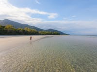 girl walking along Cape Tribulation Beach Jungle Tours and Trekking