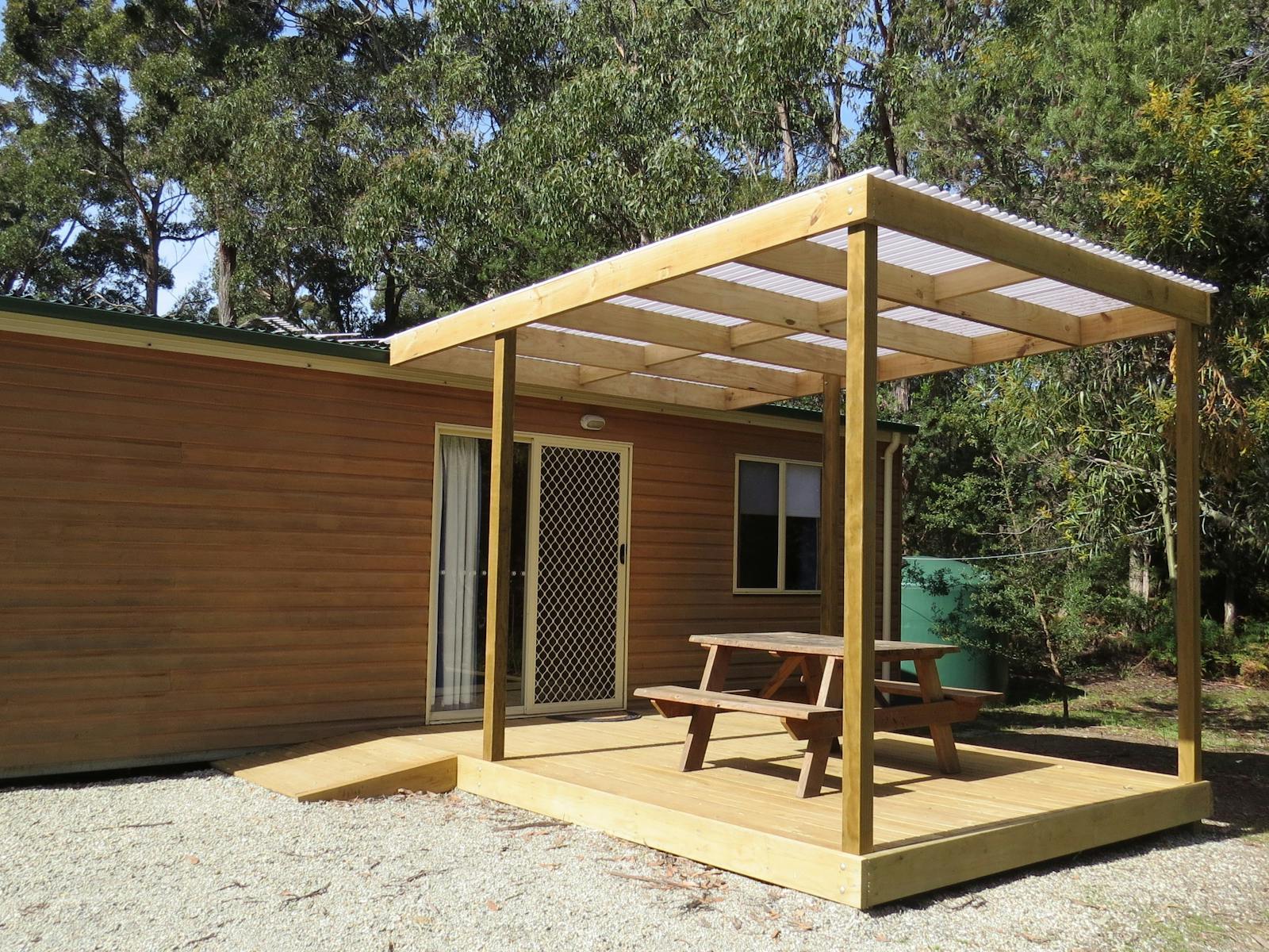 Large covered deck ideal for the family .