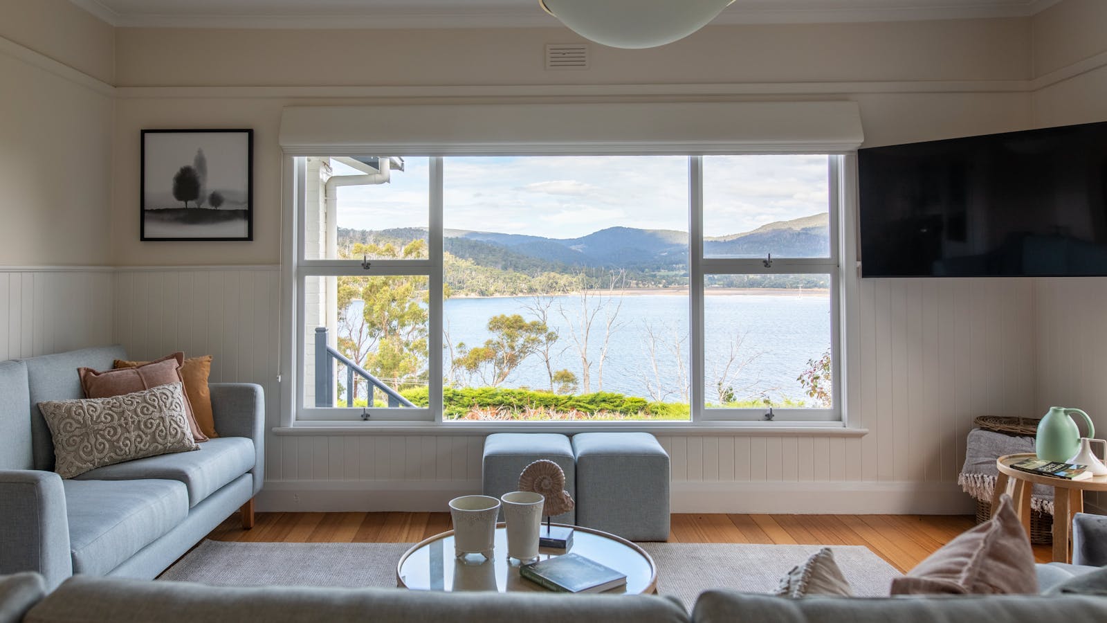 Living room with a view at Woodland Bay Retreat