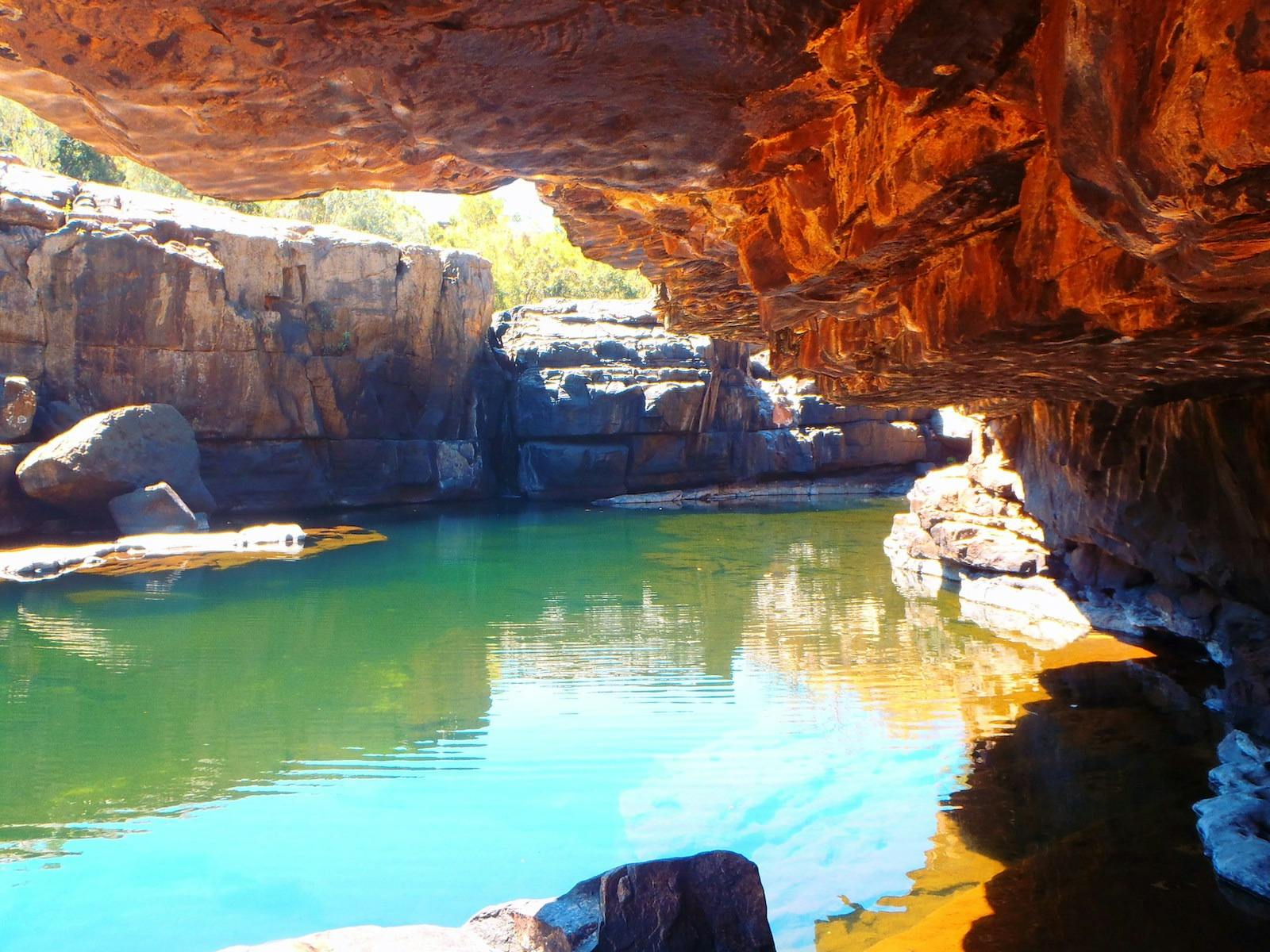 Territory Expeditions guests at Jarrangbarnmi (rock pools, waterfalls, rock landscape)