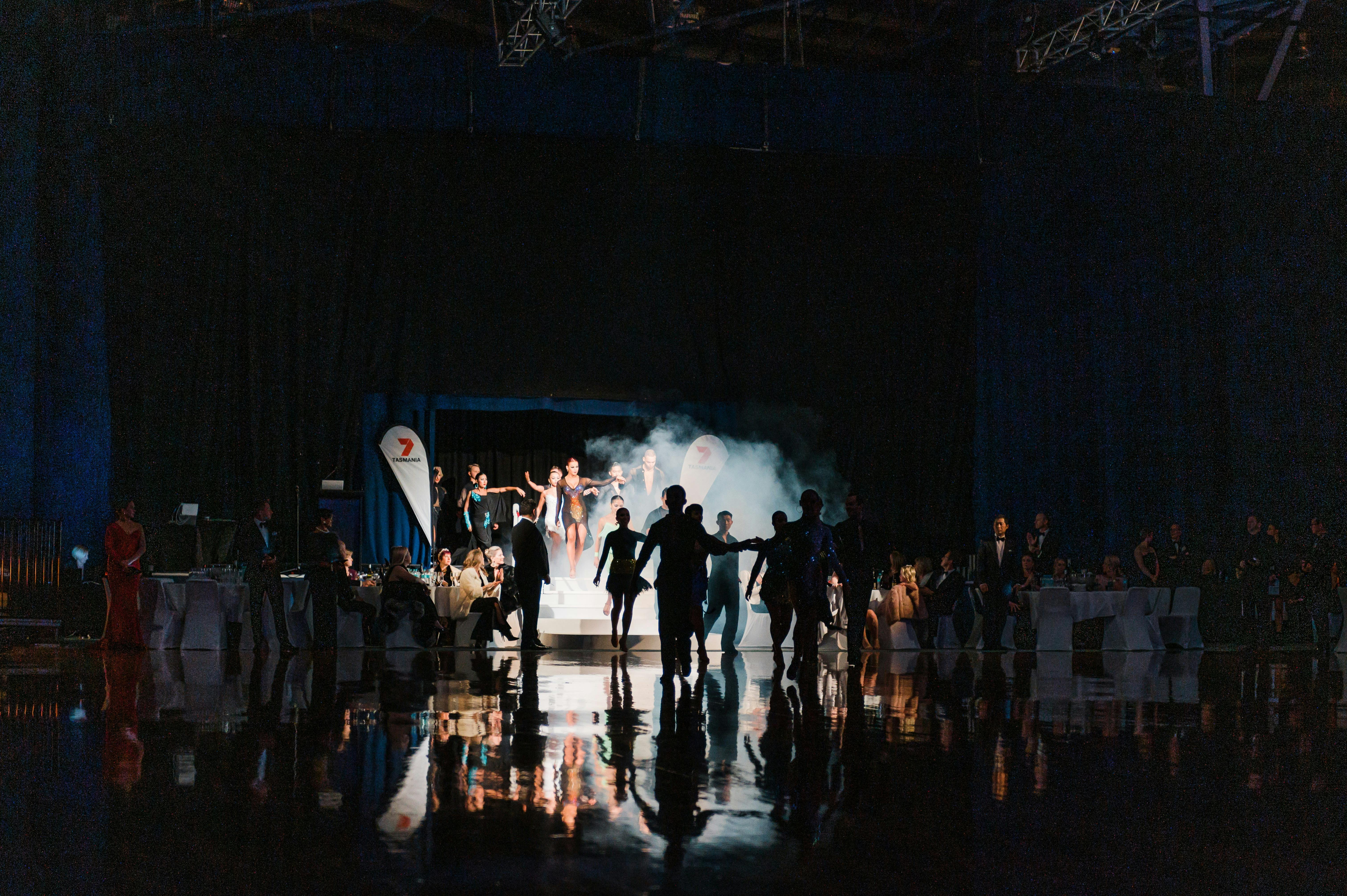 The evening opening with smoke effect as dancers enter the floor