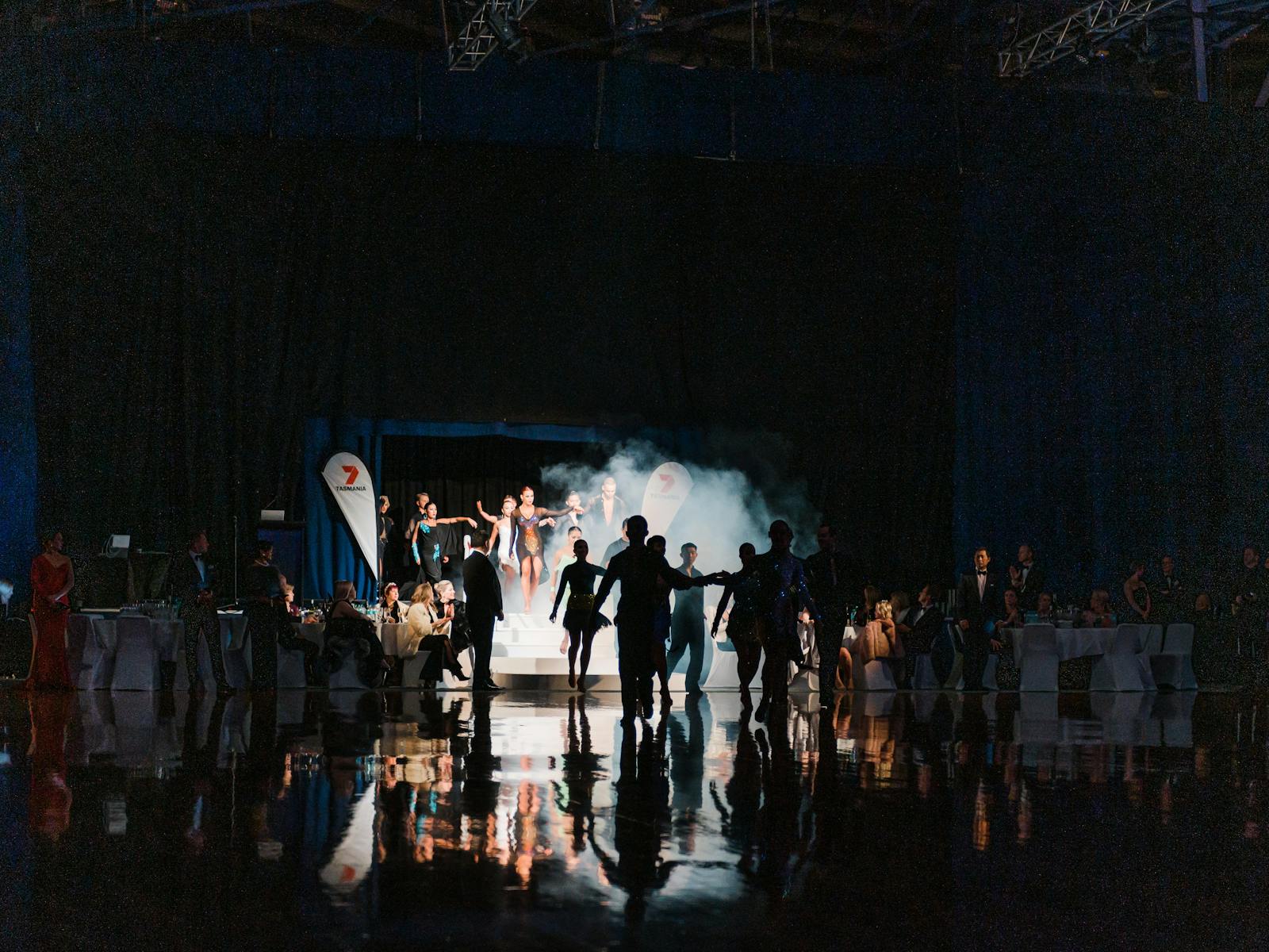 The evening opening with smoke effect as dancers enter the floor