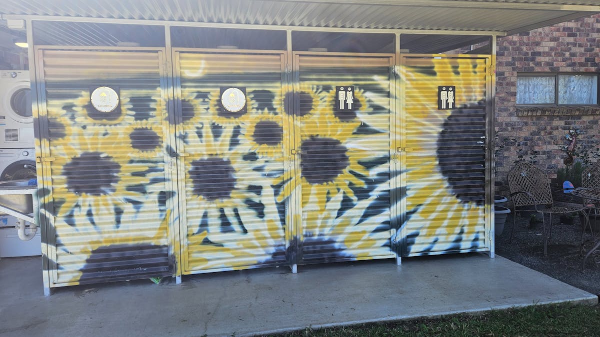 Sunflower painted shower block