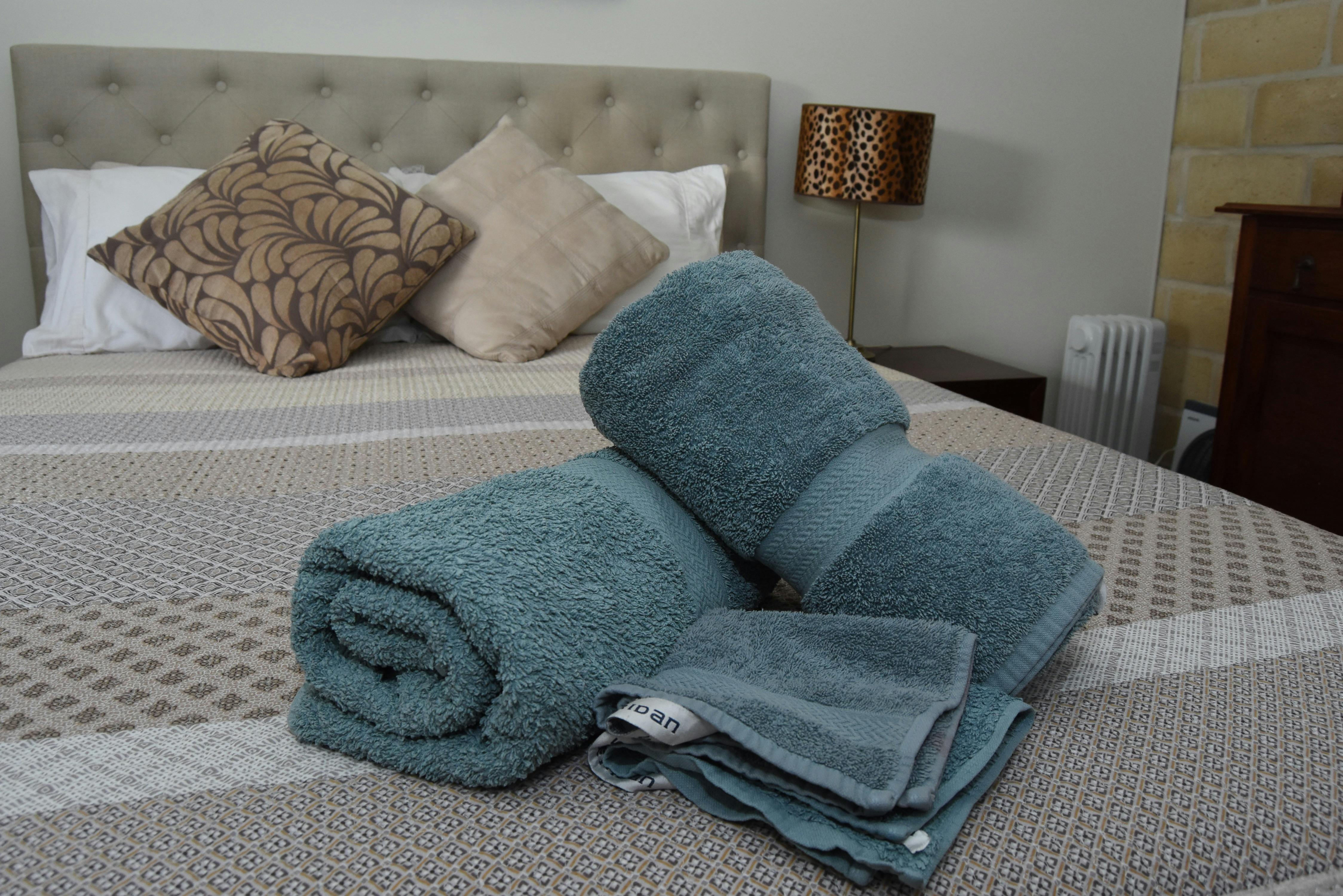 Bedroom number one features a queen sized bed