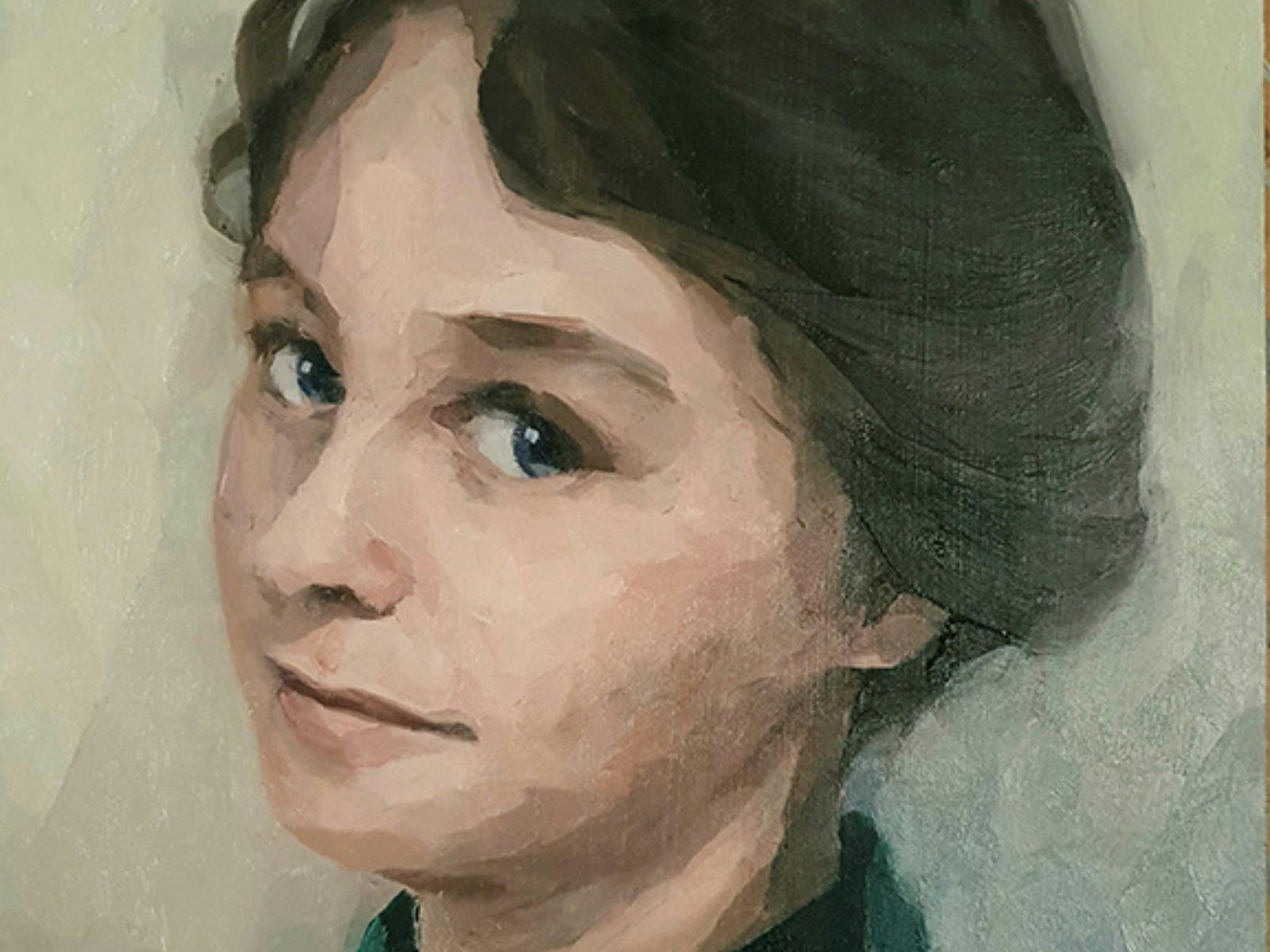 the painted face of a brunette woman looking at the viewer form the side of her eye