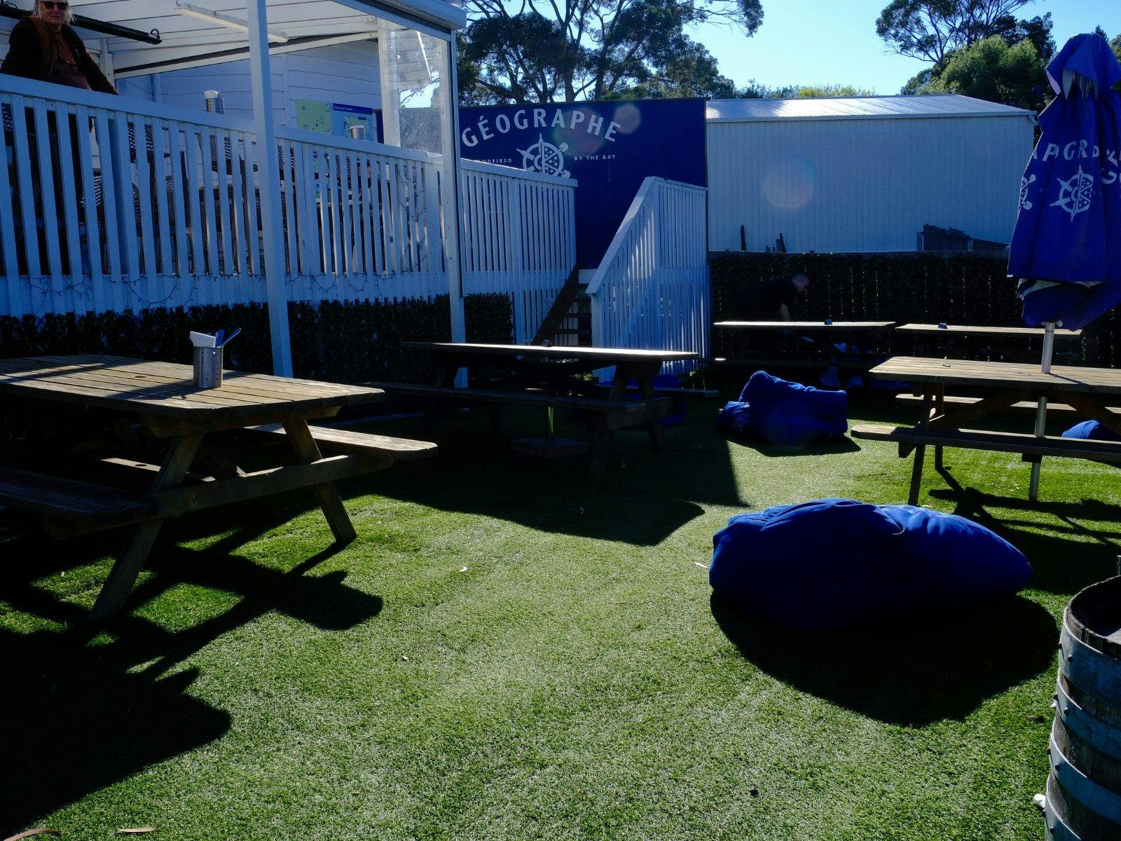 Pet-friendly alfresco dining area with picnic tables at Geographe Restaurant & Espresso Bar