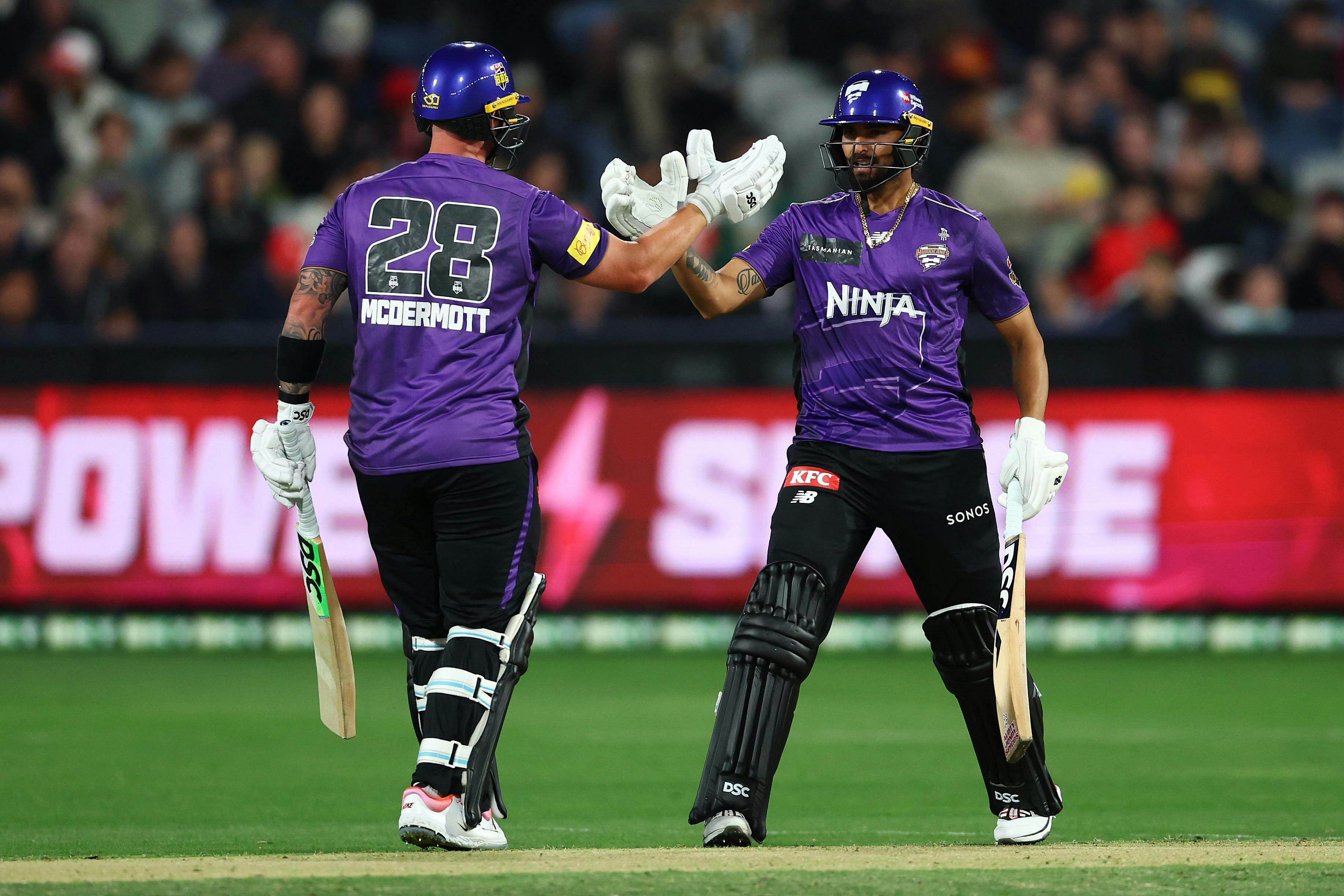 Players shaking hands after batting