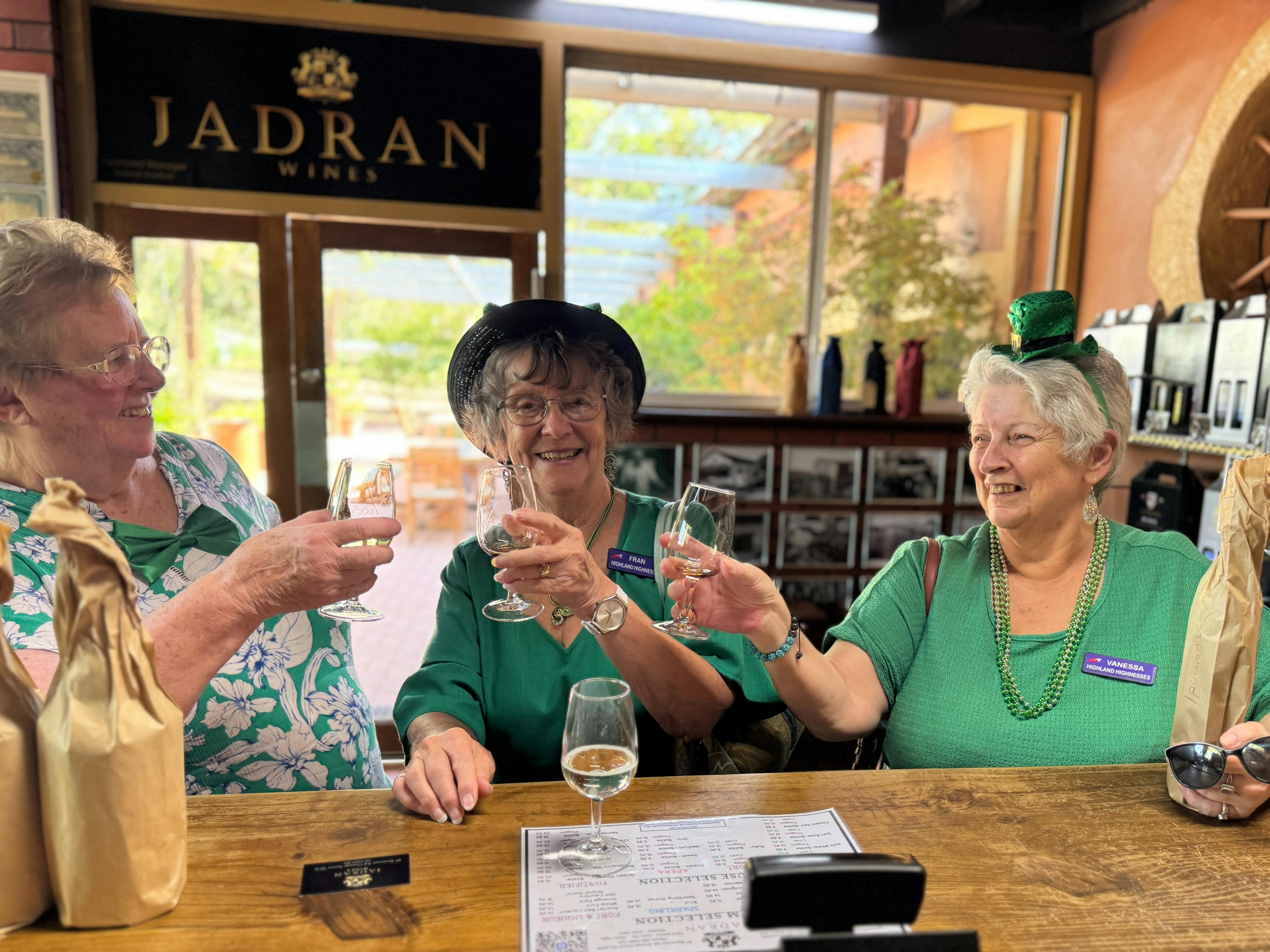 Red Hat ladies enjoying a wine tour at Jadran Wines