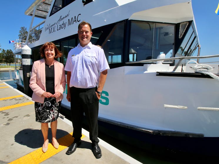 Mayor Kay Fraser and Peter standing infront of the vessel 'Lady Mac'