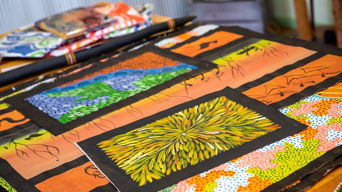 First Nations canvasses on table