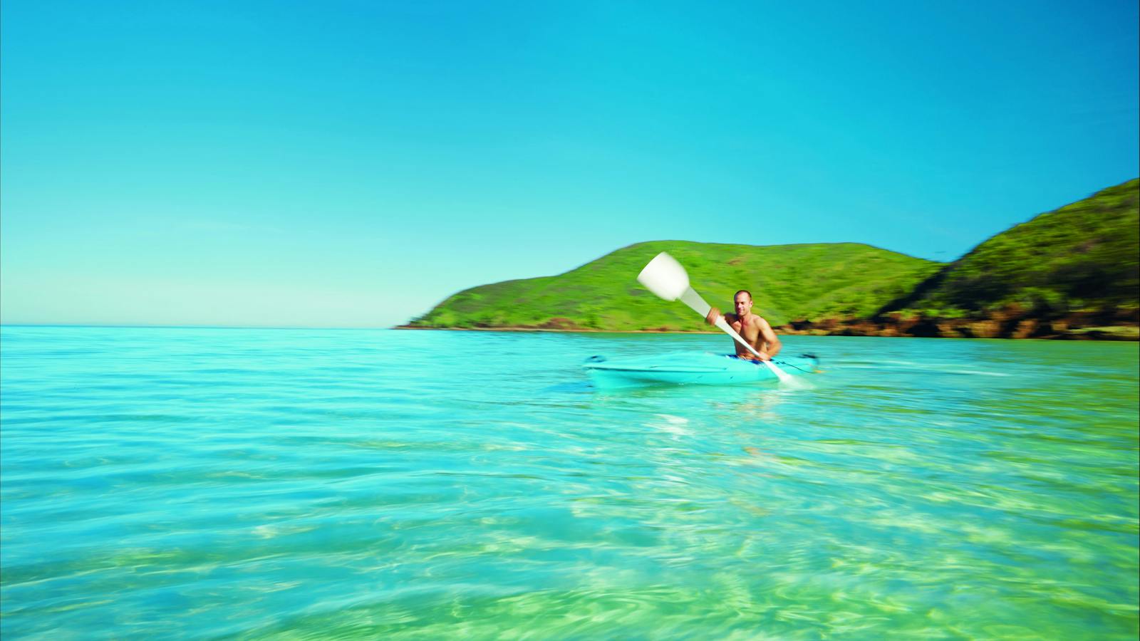 Kayaking along Basil Bay