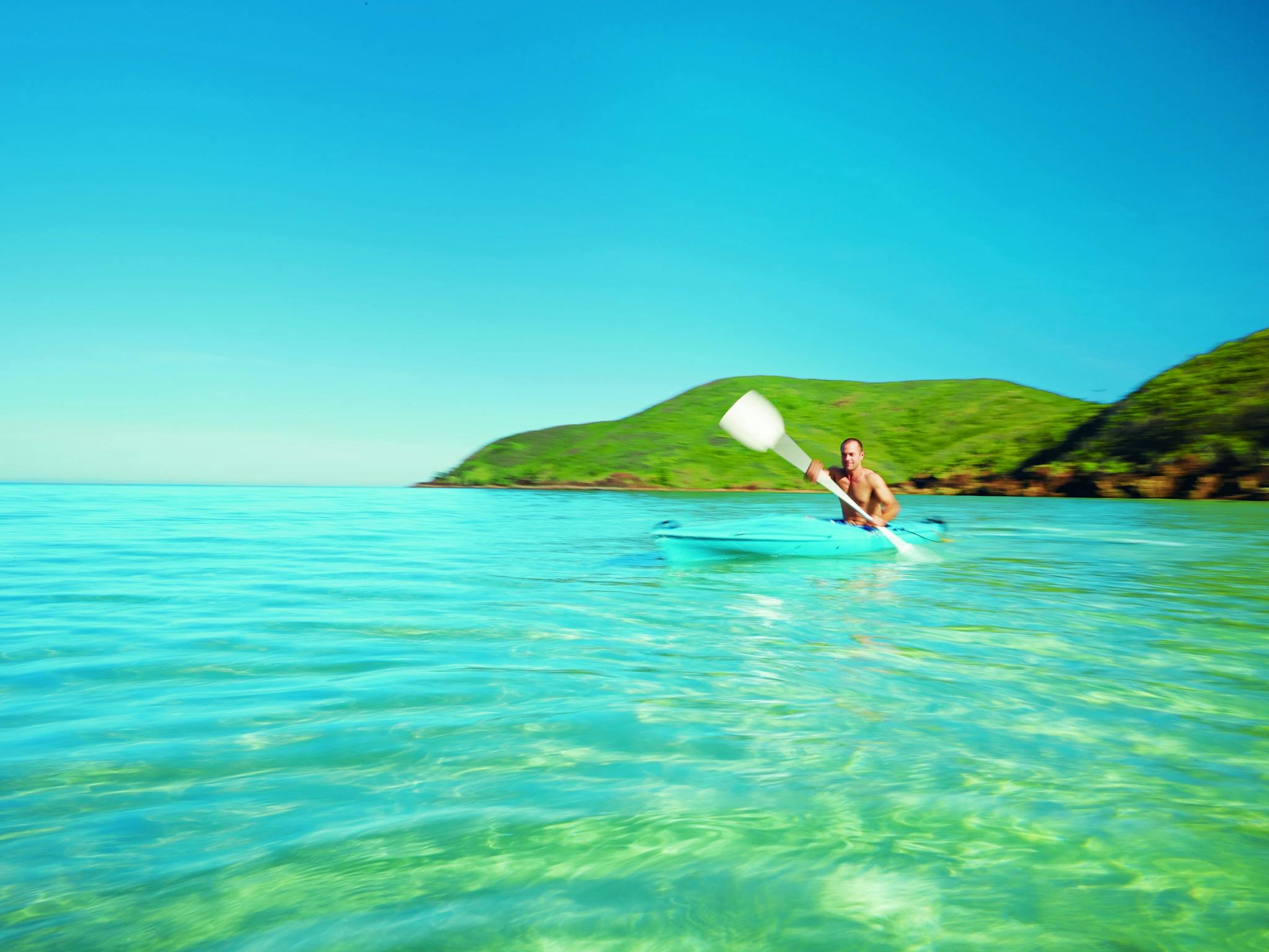 Kayaking along Basil Bay