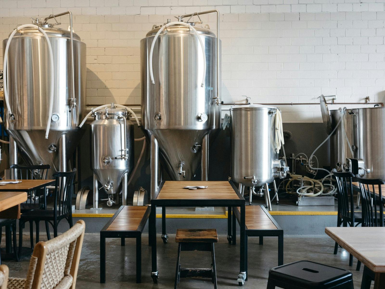 The brew deck behind tables at Hang 10 Distillery