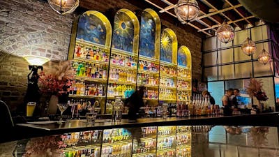 Beautiful decorative shelves behind bar