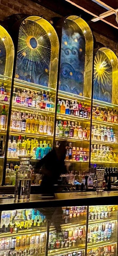 Beautiful decorative shelves behind bar