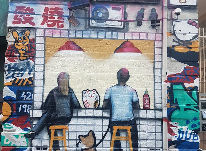 outside photo of honkas restaurant mural