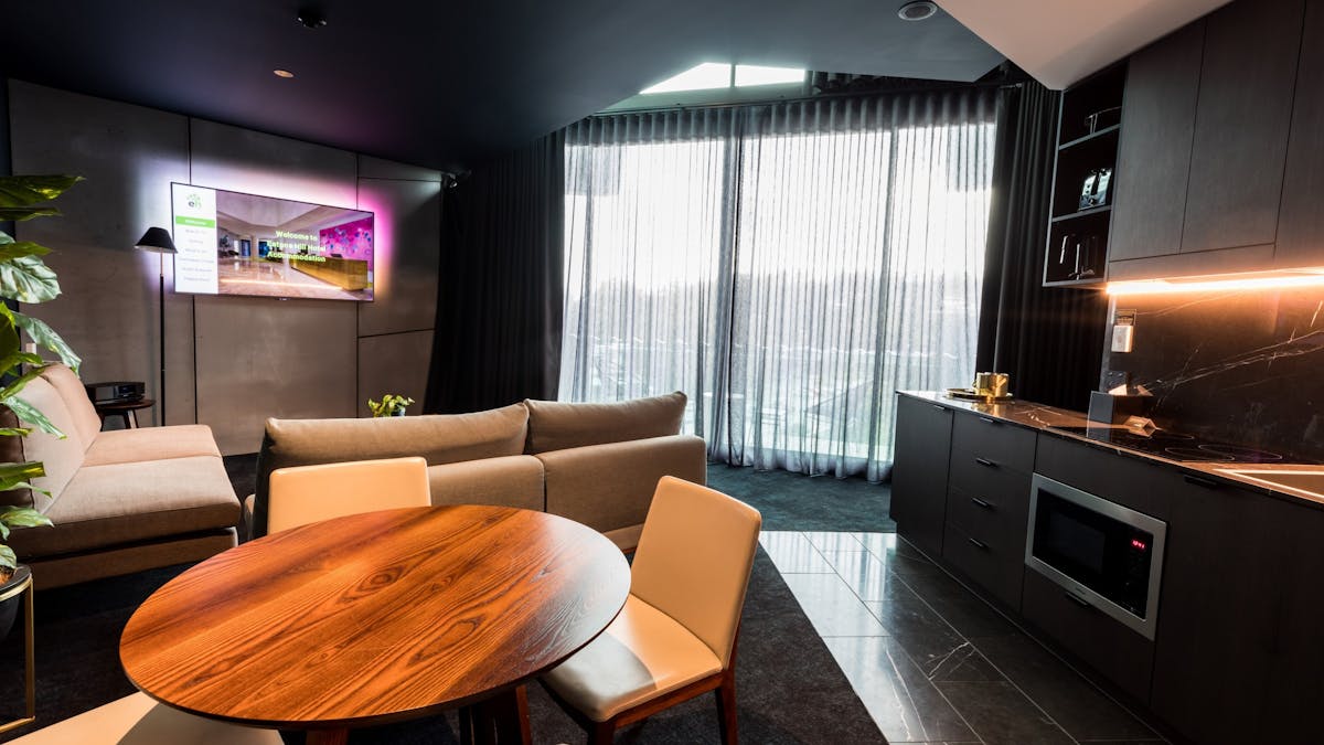 The Luxury Sky Penthouse Living Area and Kitchenette allows guests to enjoy a long stay in comfort