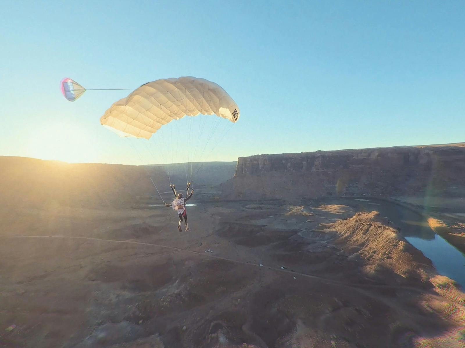 Paraglider over a canyon