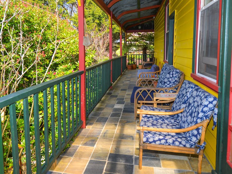 Sunny verandah with armchairs
