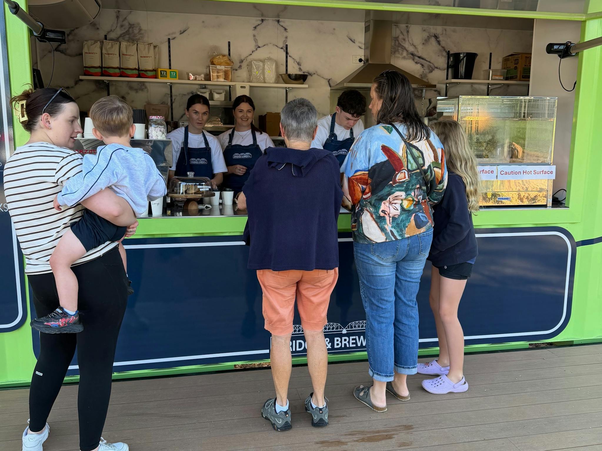 Customers ordering at the counter