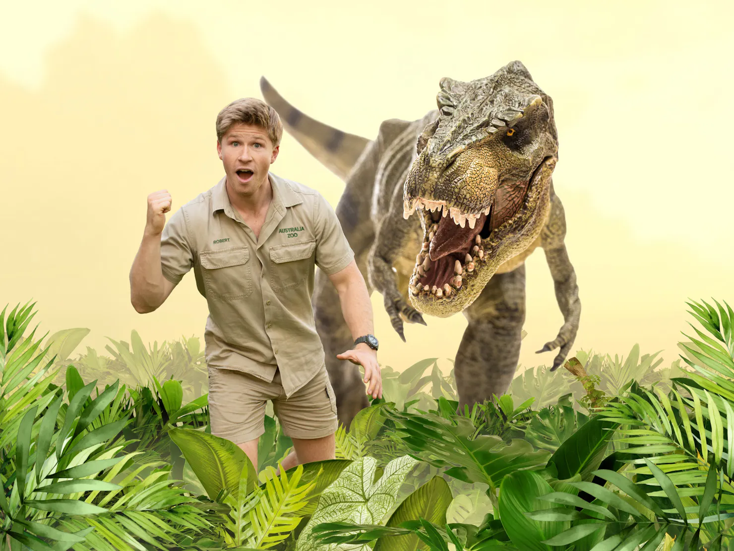 Robert Irwin with dinosaur statue