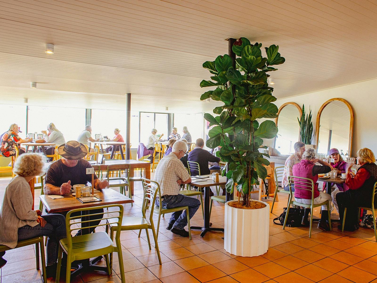 Customers dining at Larder & Home