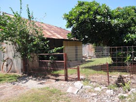 Shed and fencing along the Main Terrace facade