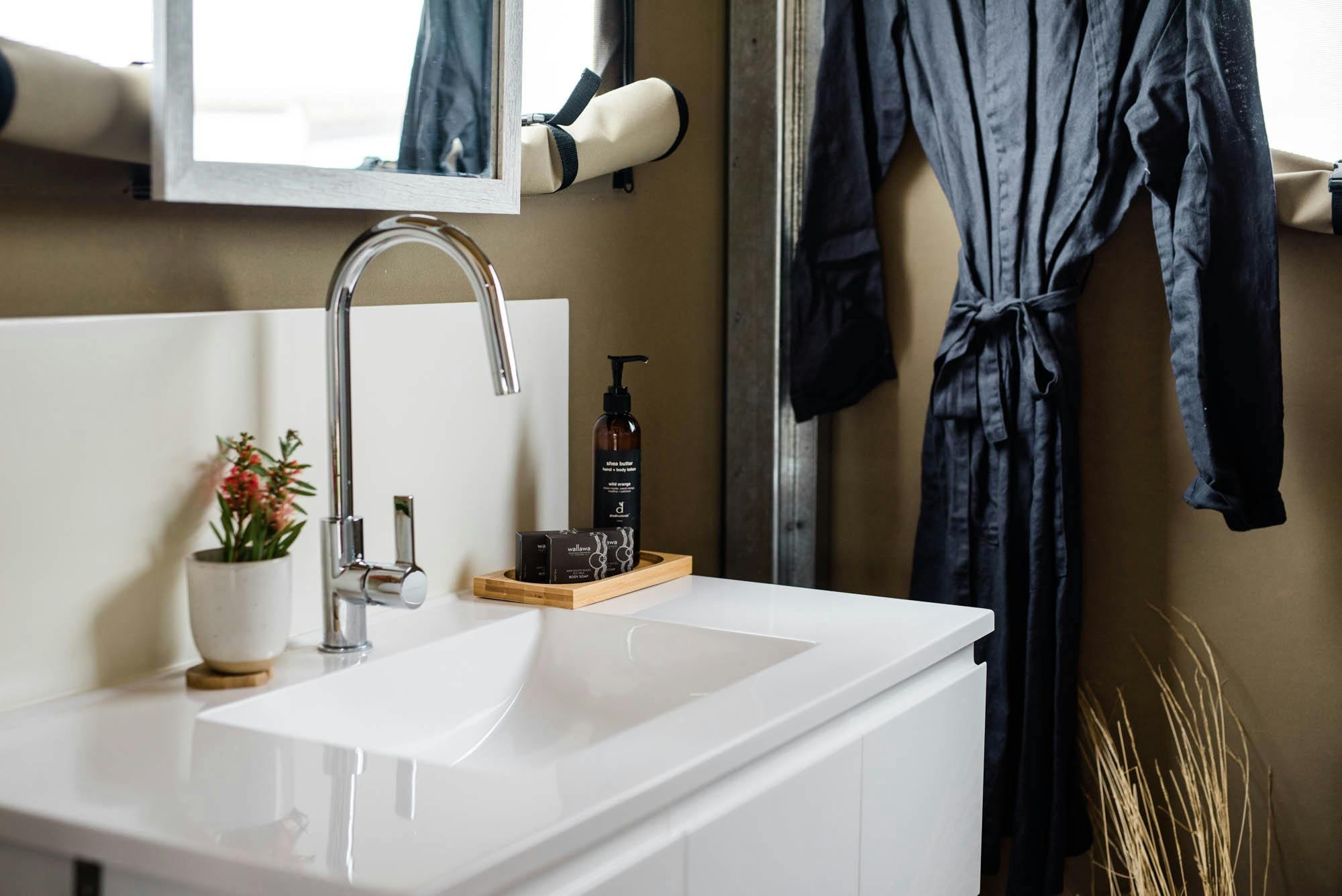 Clean white basin with silver tap