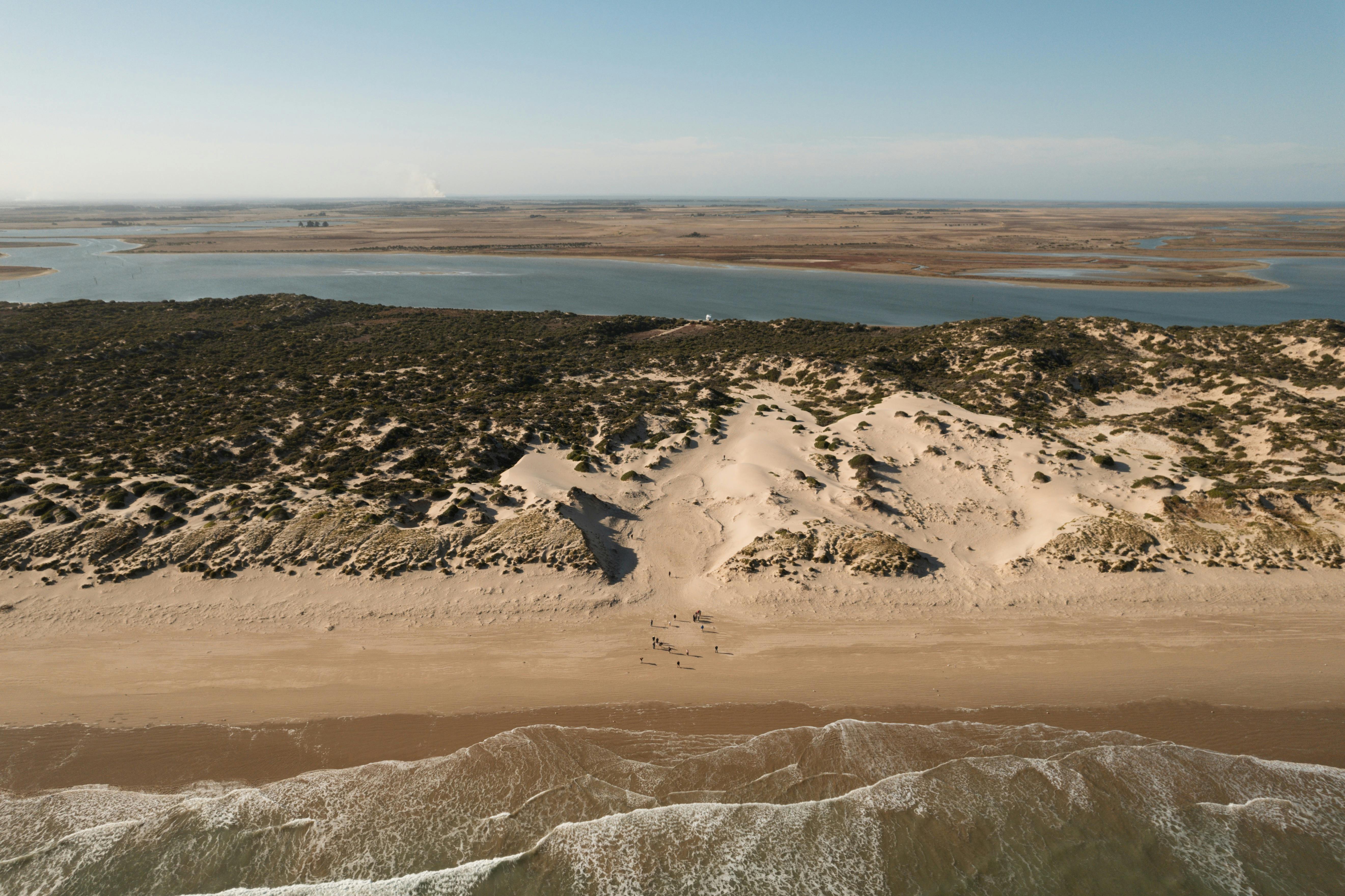 Blustery ocean on one side, tranquil lagoon on the other.